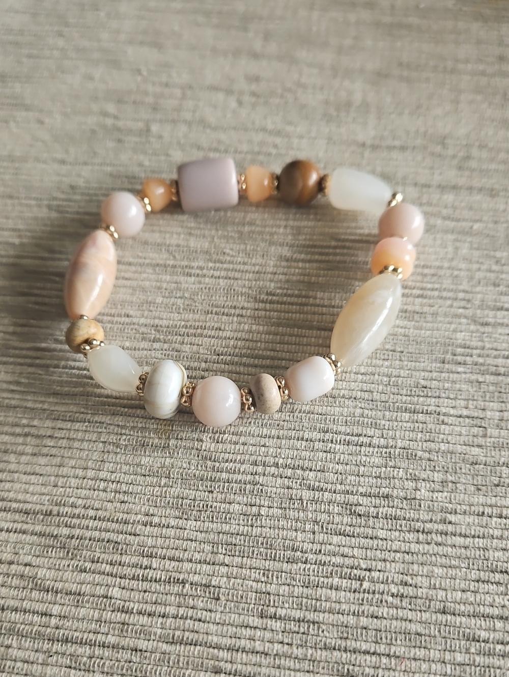 4 For $10 Avon Soft Sand Beaded Bracelet.